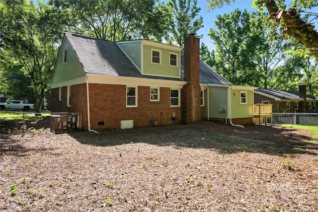 6127 Eagle Peak Dr, Charlotte, NC 28214 - back of house with a chimney, brick siding, crawl space, and roof with shingles