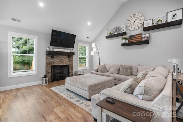140 Maplewood Ct, Hudson, NC 28638 - living area with wood finished floors, vaulted ceiling, a fireplace, baseboards, and recessed lighting