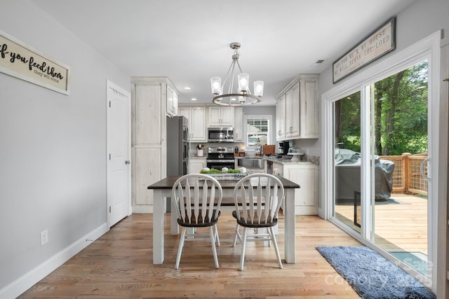 140 Maplewood Ct, Hudson, NC 28638 - kitchen featuring stainless steel appliances, healthy amount of natural light, a chandelier, light wood-style flooring, and recessed lighting