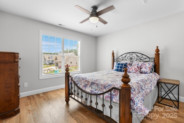 140 Maplewood Ct, Hudson, NC 28638 - bedroom with baseboards, wood finished floors, and a ceiling fan