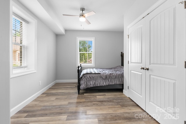 140 Maplewood Ct, Hudson, NC 28638 - bedroom with wood finished floors, baseboards, and ceiling fan