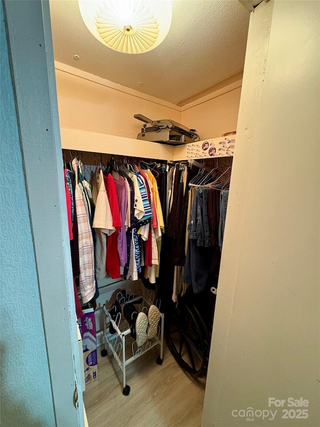 5022 Wrenn Dr, Denver, NC 28037 - walk in closet with wood finished floors