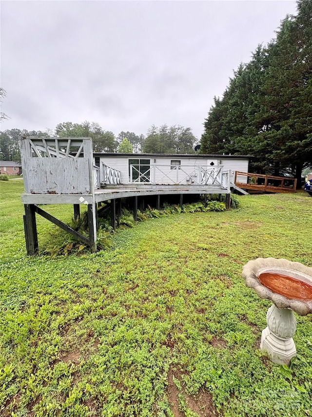 5022 Wrenn Dr, Denver, NC 28037 - view of grassy yard with a wooden deck