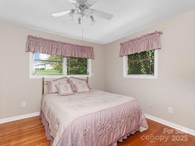 167 Panorama Dr, Franklin, NC 28734 - bedroom with wood finished floors, baseboards, and ceiling fan
