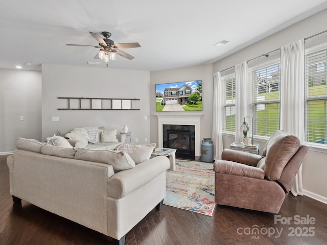 417 Livingston Dr, Lancaster, SC 29720 - living room featuring dark wood-style floors, a glass covered fireplace, ceiling fan, and recessed lighting