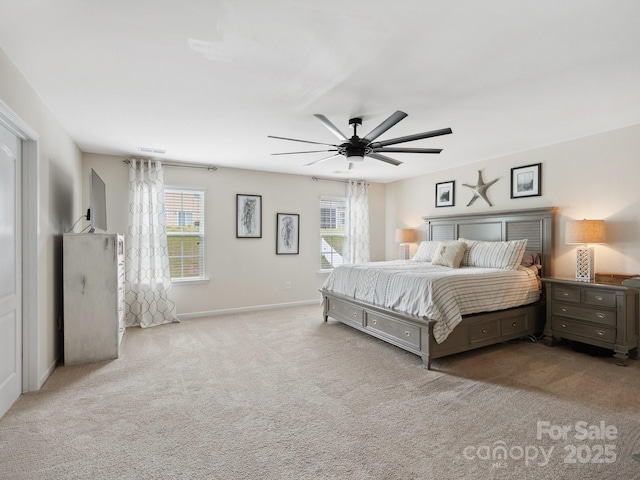 417 Livingston Dr, Lancaster, SC 29720 - carpeted bedroom with multiple windows and a ceiling fan