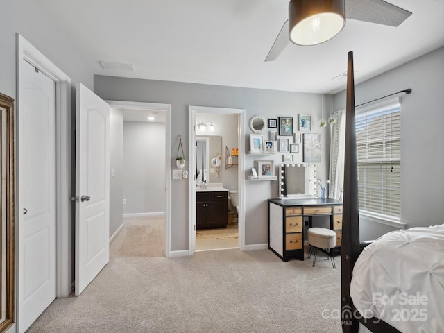 417 Livingston Dr, Lancaster, SC 29720 - bedroom with light colored carpet, ensuite bathroom, and a ceiling fan