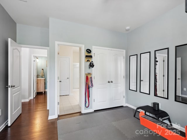 417 Livingston Dr, Lancaster, SC 29720 - bedroom featuring dark wood finished floors and a closet