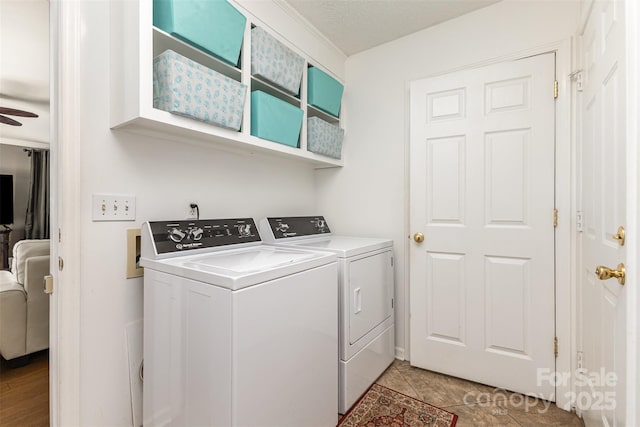 3060 Texs Fish Camp Rd, Connelly Springs, NC 28612 - washroom featuring washing machine and dryer, ceiling fan, and light tile patterned floors