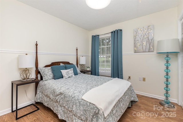 3060 Texs Fish Camp Rd, Connelly Springs, NC 28612 - bedroom with wood finished floors and baseboards