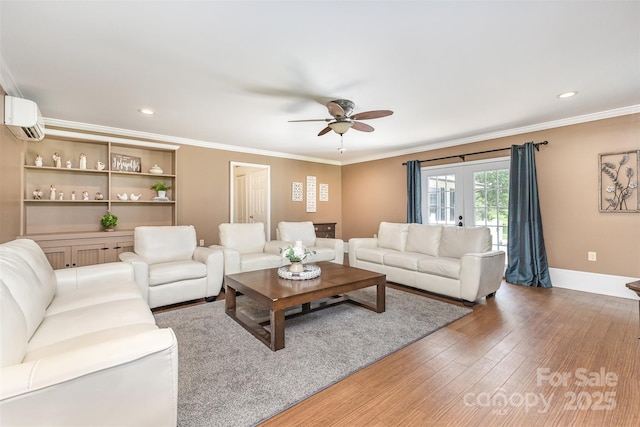 3060 Texs Fish Camp Rd, Connelly Springs, NC 28612 - living area featuring an AC wall unit, ceiling fan, wood finished floors, crown molding, and recessed lighting