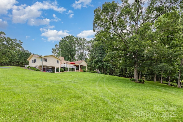 3060 Texs Fish Camp Rd, Connelly Springs, NC 28612 - view of grassy yard with a carport
