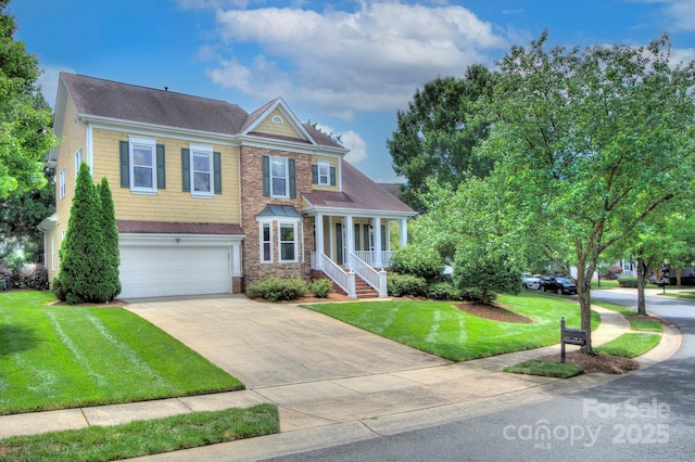 8044 Hawk Crest Ct, Charlotte, NC 28270 - view of front of property featuring a garage, a front lawn, driveway, covered porch, and stone siding