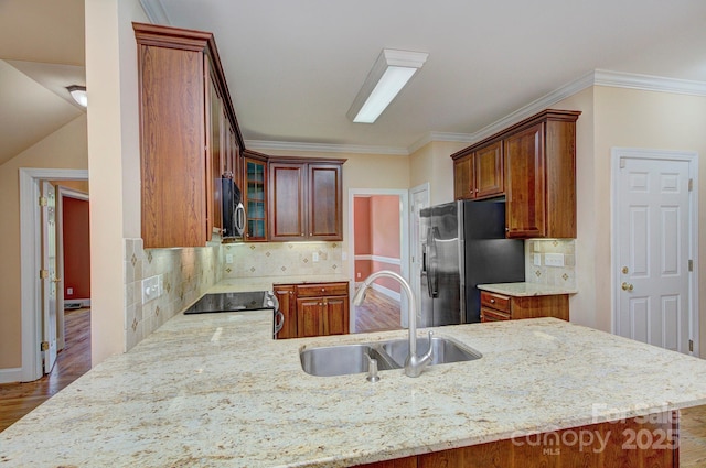 8044 Hawk Crest Ct, Charlotte, NC 28270 - kitchen featuring stainless steel fridge, electric range oven, a peninsula, glass insert cabinets, and light stone countertops