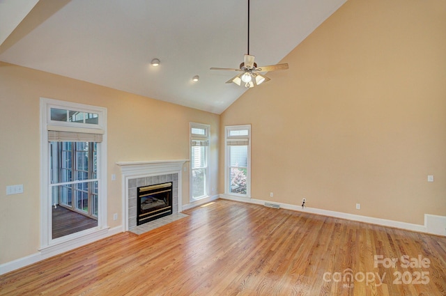 8044 Hawk Crest Ct, Charlotte, NC 28270 - unfurnished living room featuring light wood-style floors, a fireplace, a ceiling fan, high vaulted ceiling, and recessed lighting