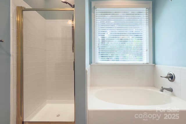 8044 Hawk Crest Ct, Charlotte, NC 28270 - bathroom featuring a garden tub and a shower stall