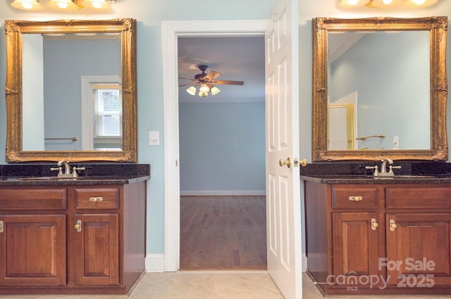 8044 Hawk Crest Ct, Charlotte, NC 28270 - full bath featuring two vanities, a ceiling fan, and tile patterned flooring