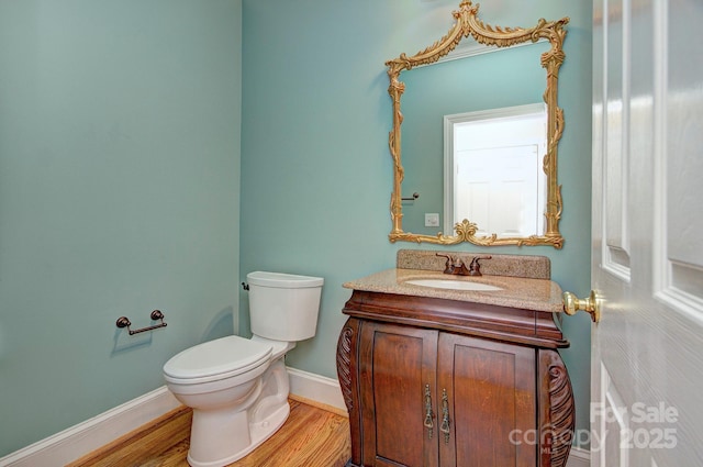 8044 Hawk Crest Ct, Charlotte, NC 28270 - half bathroom with vanity and wood finished floors