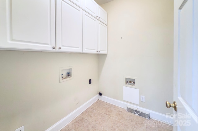 8044 Hawk Crest Ct, Charlotte, NC 28270 - laundry room with cabinet space, hookup for a washing machine, and light tile patterned floors