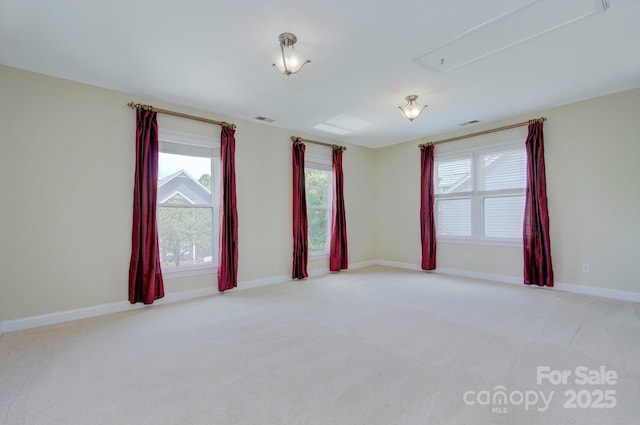 8044 Hawk Crest Ct, Charlotte, NC 28270 - spare room featuring attic access and carpet floors