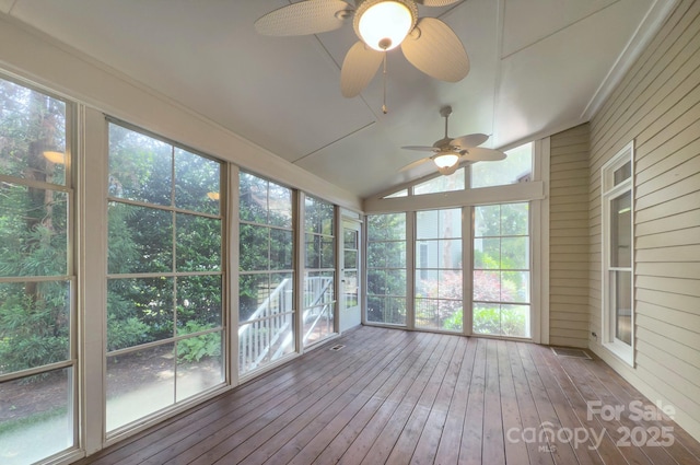 8044 Hawk Crest Ct, Charlotte, NC 28270 - unfurnished sunroom featuring ceiling fan, wooden walls, wood-type flooring, and vaulted ceiling