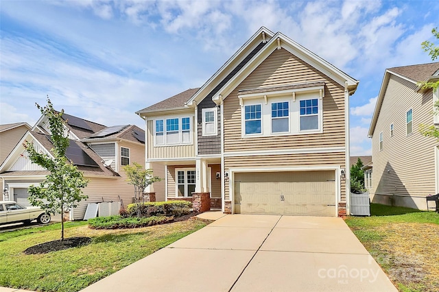 10004 Perth Moor Rd, Charlotte, NC 28278 - view of front of house featuring a garage, concrete driveway, a front lawn, and stone siding
