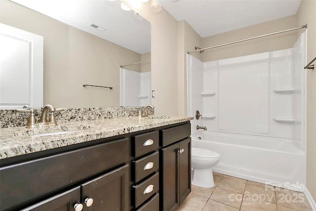 10004 Perth Moor Rd, Charlotte, NC 28278 - bathroom featuring double vanity, tile patterned flooring, toilet, and shower / tub combination