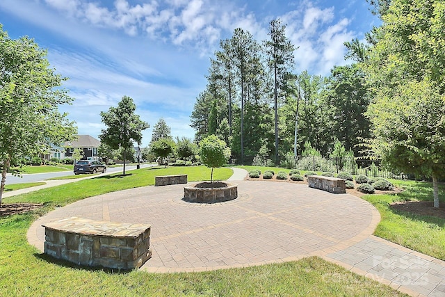 10004 Perth Moor Rd, Charlotte, NC 28278 - view of patio / terrace featuring an outdoor fire pit