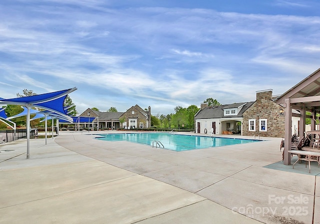 10004 Perth Moor Rd, Charlotte, NC 28278 - community pool featuring a patio area