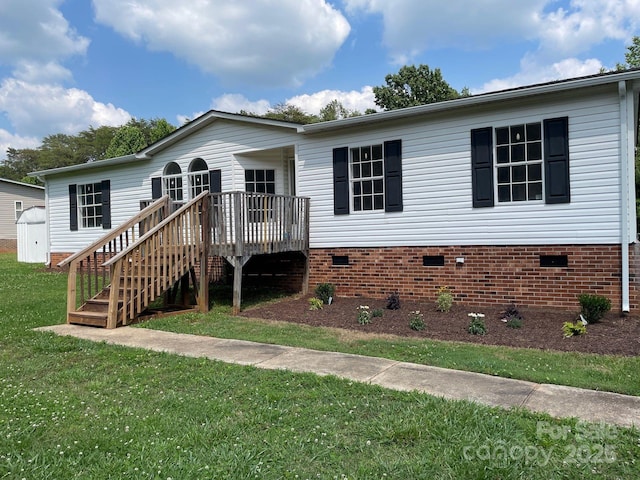 1201 Forest Ridge Rd, Bessemer City, NC 28016 - view of front facade with crawl space, a front yard, and a wooden deck