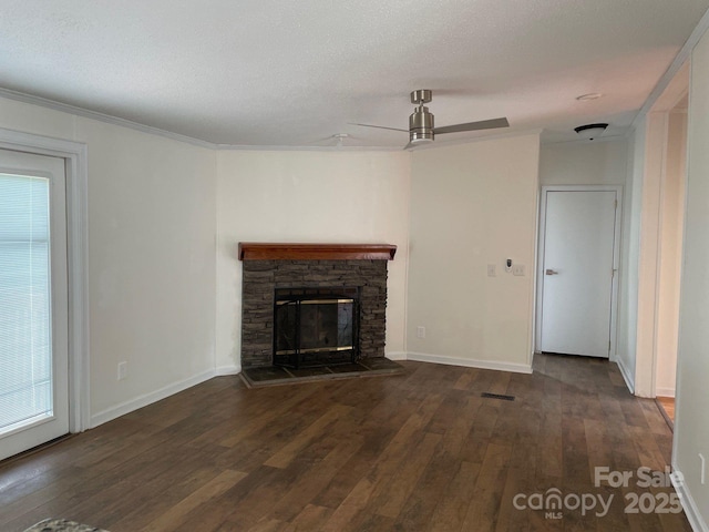 1201 Forest Ridge Rd, Bessemer City, NC 28016 - unfurnished living room featuring hardwood / wood-style floors, a stone fireplace, a textured ceiling, baseboards, and crown molding