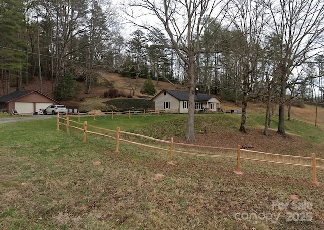 1383 Probart St, Brevard, NC 28712 - view of yard featuring a garage and driveway