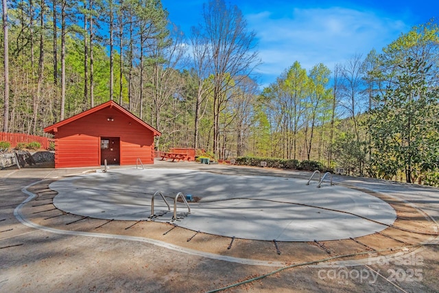 447 Hidden Lake Pkwy, Nebo, NC 28761 - view of pool with a wooded view
