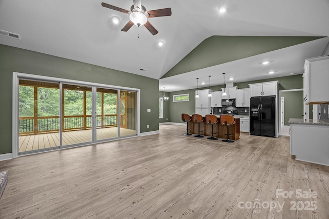 140 Cove Crest Dr, Rutherfordton, NC 28139 - living room featuring ceiling fan, light wood-type flooring, high vaulted ceiling, baseboards, and recessed lighting