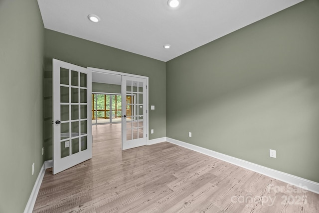 140 Cove Crest Dr, Rutherfordton, NC 28139 - empty room with french doors, baseboards, wood finished floors, and recessed lighting