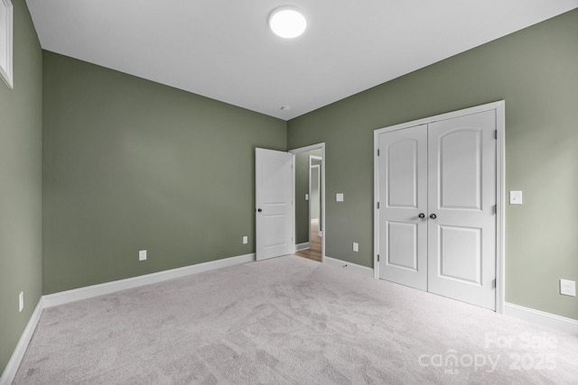 140 Cove Crest Dr, Rutherfordton, NC 28139 - unfurnished bedroom with carpet floors, baseboards, and a closet