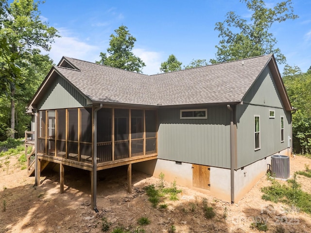 140 Cove Crest Dr, Rutherfordton, NC 28139 - rear view of house with roof with shingles, a sunroom, crawl space, and central AC unit