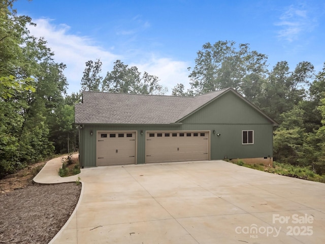 140 Cove Crest Dr, Rutherfordton, NC 28139 - view of front of house with driveway, an attached garage, and roof with shingles