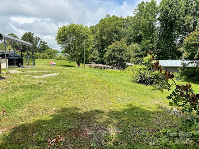 78 Moffitt Hill Church Rd, Old Fort, NC 28762 - view of grassy yard featuring a carport