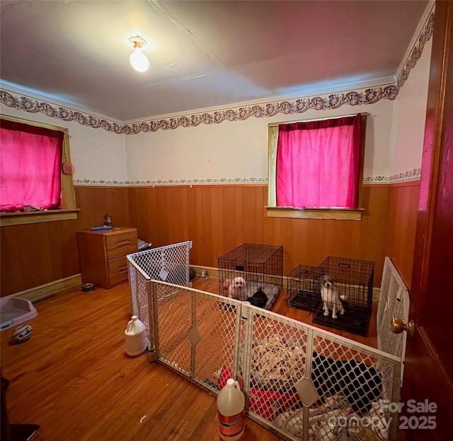 78 Moffitt Hill Church Rd, Old Fort, NC 28762 - bedroom featuring wood finished floors, wood walls, and wainscoting