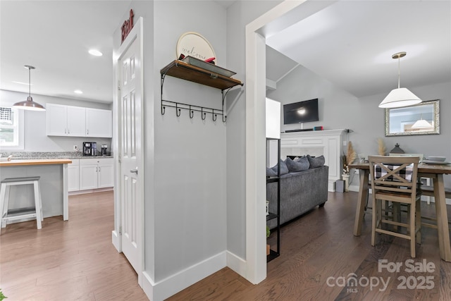 6313 Weddington Rd, Concord, NC 28027 - corridor with light wood-type flooring and recessed lighting