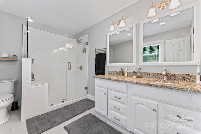 6313 Weddington Rd, Concord, NC 28027 - bathroom featuring double vanity, a shower stall, tile patterned floors, and recessed lighting