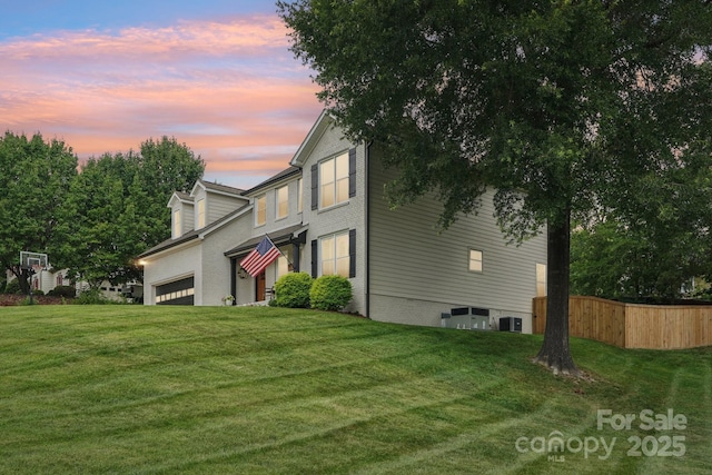 207 Spaniel Dr SE, Concord, NC 28025 - view of side of home featuring a central AC unit and a garage