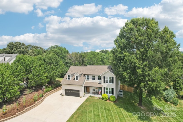 207 Spaniel Dr SE, Concord, NC 28025 - view of front of property featuring concrete driveway, an attached garage, and stucco siding