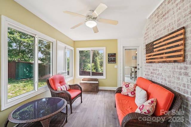 207 Spaniel Dr SE, Concord, NC 28025 - sunroom / solarium with wood finished floors and brick wall