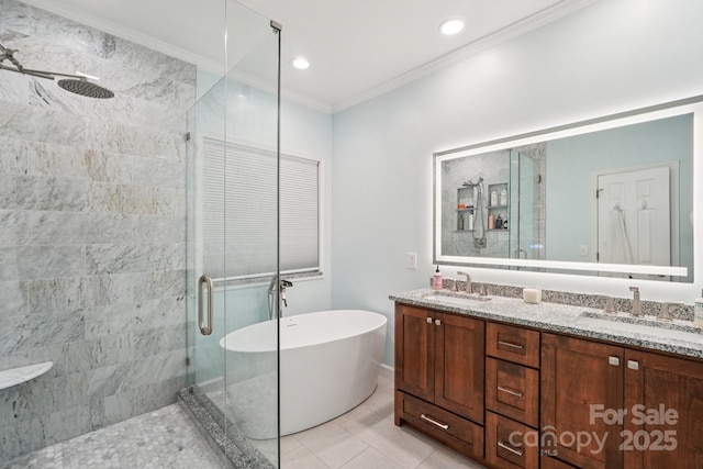207 Spaniel Dr SE, Concord, NC 28025 - full bathroom with a stall shower, a freestanding tub, double vanity, crown molding, and tile patterned flooring