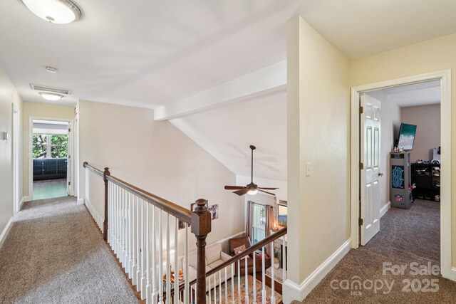 207 Spaniel Dr SE, Concord, NC 28025 - hall with an upstairs landing, carpet floors, and vaulted ceiling