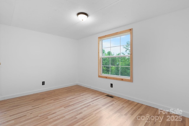 8692 Lambs Way, Connelly Springs, NC 28612 - spare room featuring wood finished floors and baseboards