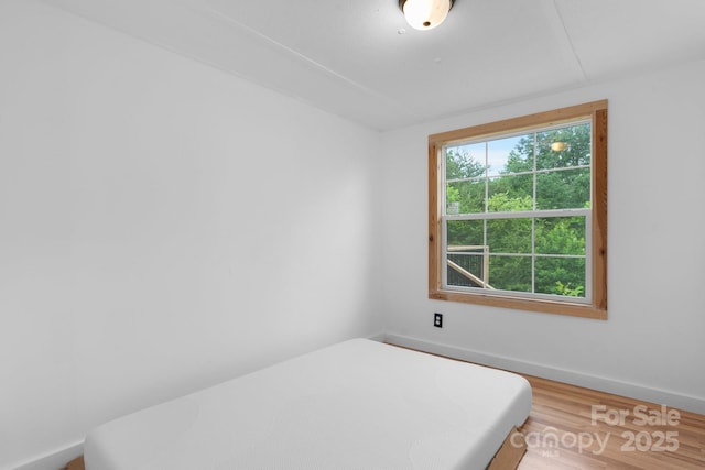 8692 Lambs Way, Connelly Springs, NC 28612 - bedroom with wood finished floors and baseboards