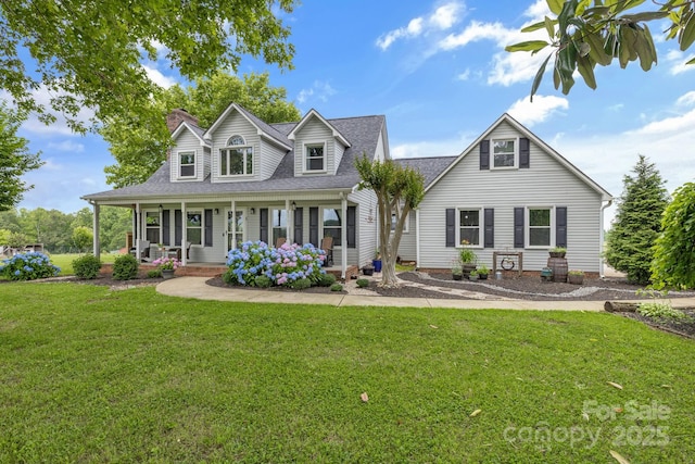 333 Lambs Grill Rd, Rutherfordton, NC 28139 - view of front facade featuring a porch, a chimney, a front lawn, and roof with shingles